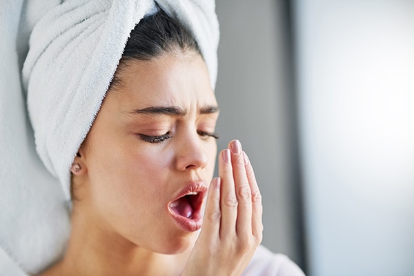 woman with towel on her head